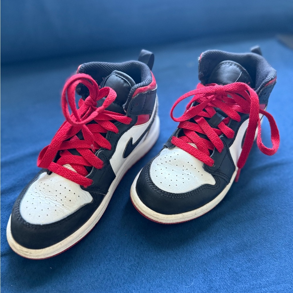 Nike Kids Black, White, and Red Sneakers